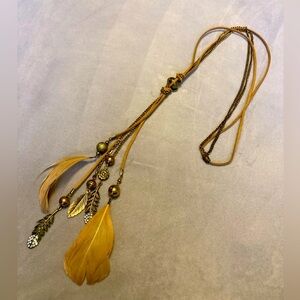 Gold feather and suede gold necklace!!